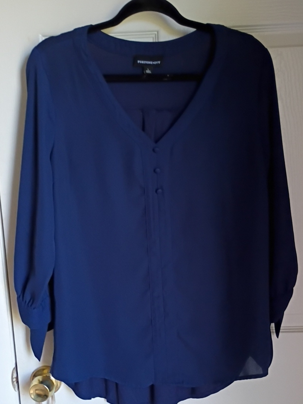 navy blue Fortune + Ivy V-neck blouse with 3/4 tie-sleeve detail